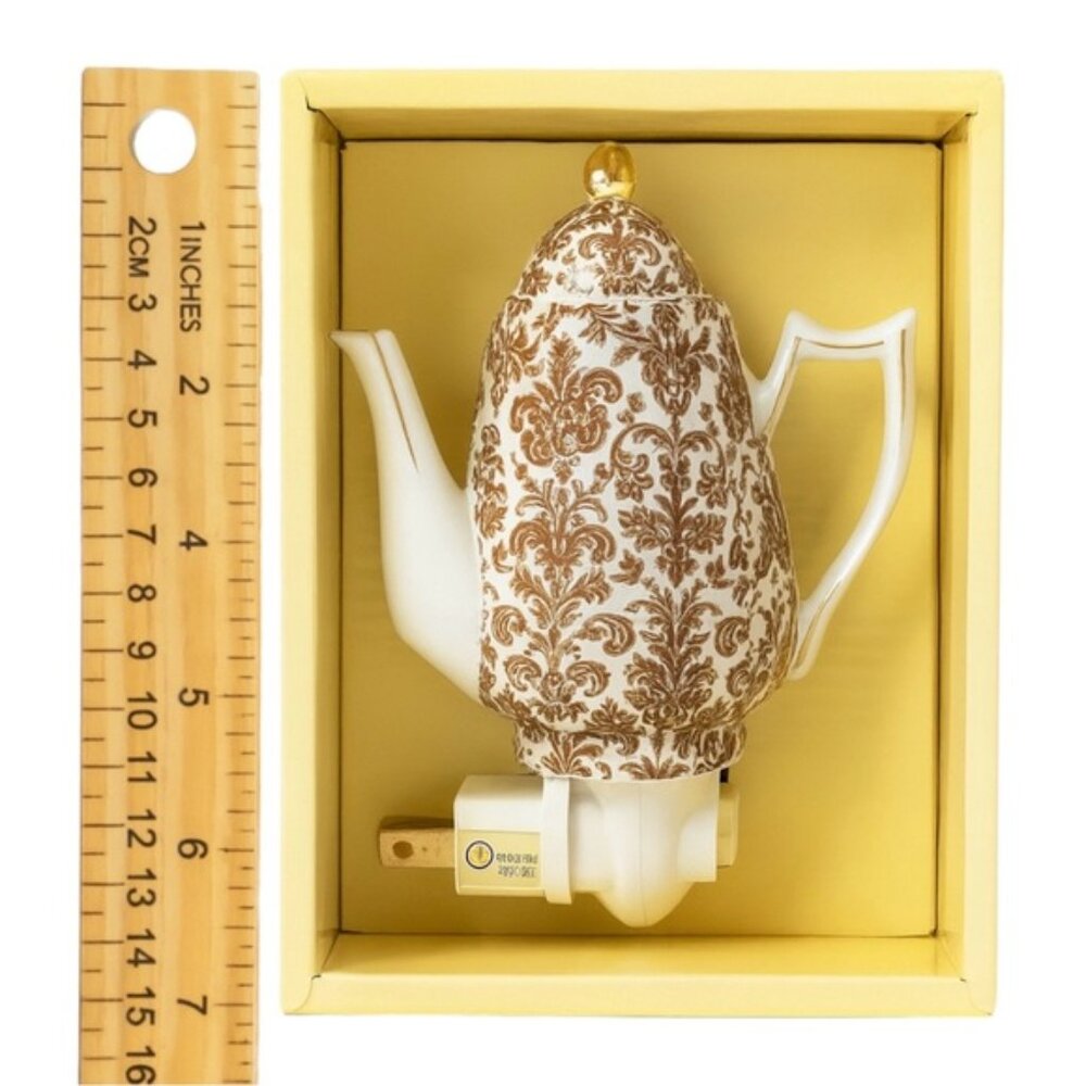 Kirkland’s Apropos Teapot Nightlight Porcelain Plug-In Lamp